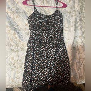 Forever 21 black spaghetti, string dress with little blue and pink tulips